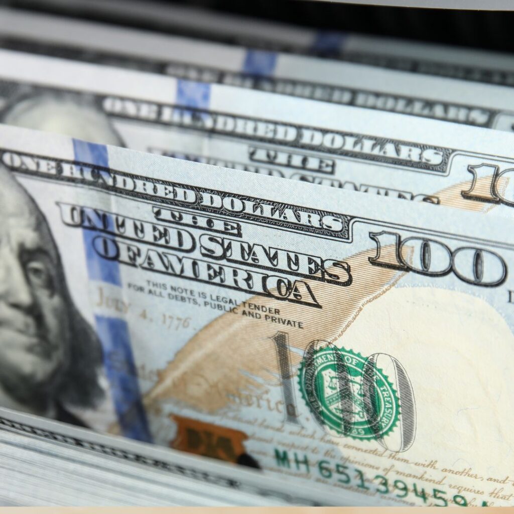 money coming out of a counting machine