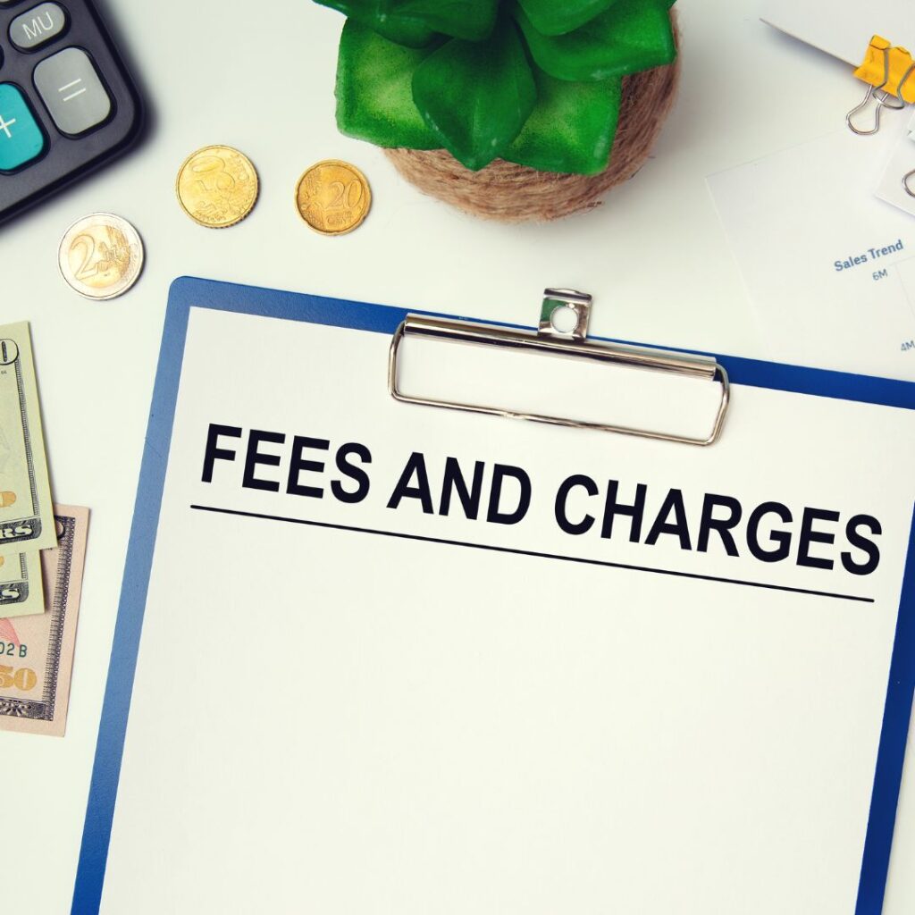 a clipboard that reads "FEES AND CHARGES"