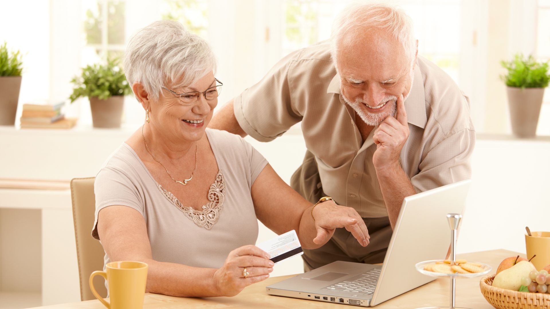 senior couple looking at life settlements