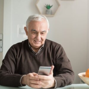 senior man on his phone