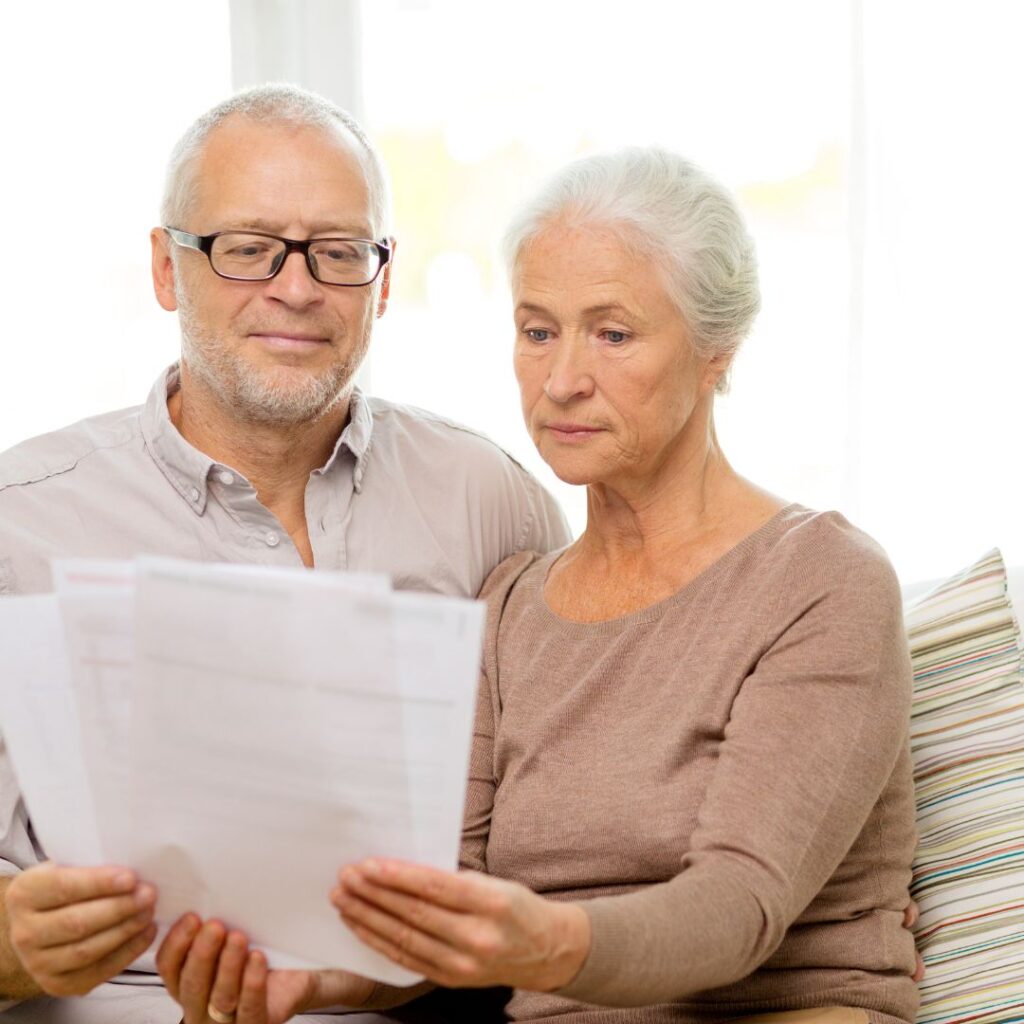 senior couple reading documents