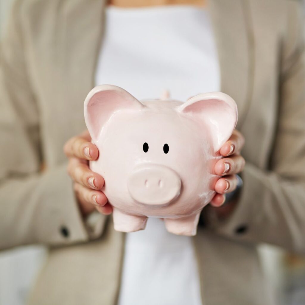 holding piggy bank