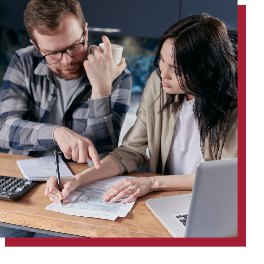 a couple looking at their bills