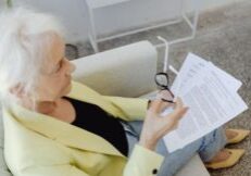 woman looking at paperwork